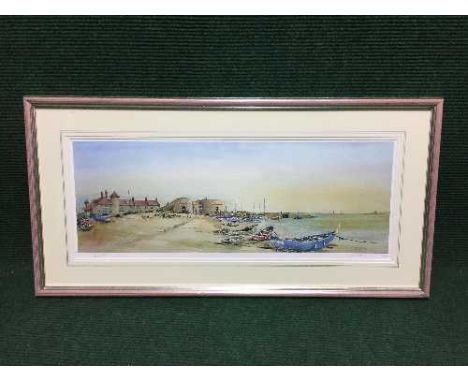 A framed signed limited edition print  - Watercolour on the beach, Beadnell by Phil Russell