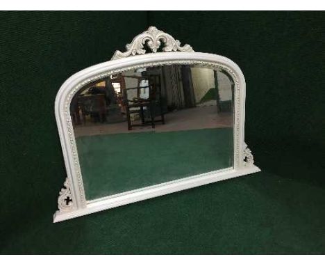 A while framed over mantel mirror 