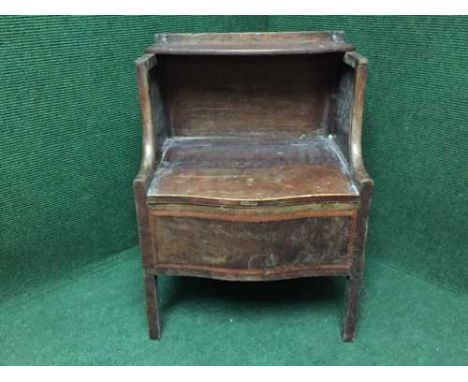 A Victorian inlaid mahogany commode 