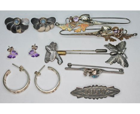 A mixed lot of silver and white metal jewellery comprising a pair of hallmarked earrings of fan form and set with a moonstone