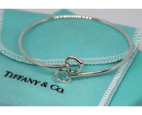 A Tiffany Elsa Peretti bangle, marked 'Tiffany &amp; Co Peretti 925 Spain', diam. approx. 5.5cm.