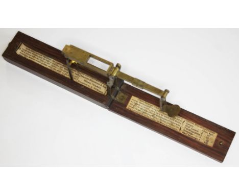 A set of 19th century sovereign scales in rosewood case, labelled 'Stephen Houghton &amp; Son, Makers, Ormskirk...'  