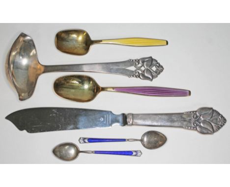 A mixed lot of Scandinavian silver comprising a silver handled knife and ladle by Mogensen, a pair of silver gilt and enamel 