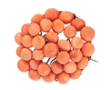 AN ANTIQUE CORAL BANGLE AND BROOCH comprising of a bangle set all over with coral beads and a round shaped brooch set all ove