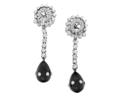 A PAIR OF DIAMOND AND ONYX DAY TO NIGHT EARRINGS in 18ct white gold, comprising of an open circular swirling design, set with