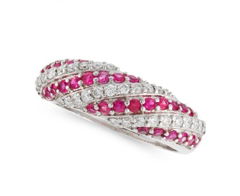 A RUBY AND DIAMOND BOMBE RING in 18ct white gold, set with alternating rows of round cut diamonds and rubies, stamped 750, si