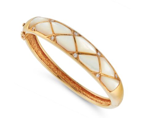 A MOTHER-OF-PEARL AND DIAMOND BANGLE, VAN CLEEF AND ARPELS in 18ct yellow gold, in harlequin design set with polished mother-