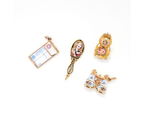 A SET OF FOUR ANTIQUE ENAMEL CHARMS in yellow gold, comprising of an enamelled chair, hand mirror, articulated letter / envel