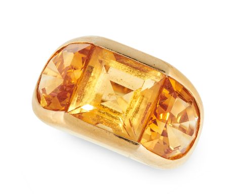 A VINTAGE CITRINE RING in yellow gold, set with a central step cut citrine between two fancy cut citrines, unmarked, size K /