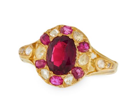 AN ANTIQUE GARNET, RUBY AND DIAMOND RING, 19TH CENTURY in yellow gold, set with an oval cut garnet, in a border of cushion cu