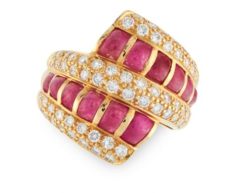 A RUBY AND DIAMOND RING in 18ct yellow gold, the twisted shank is set with alternating rows of round cut diamonds totalling 0