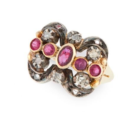 A RUBY AND DIAMOND RING set with a central row of round and oval cut rubies, in a scrolling border set with rose cut diamonds