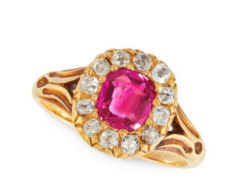 A BURMA NO HEAT AND RUBY  RING in yellow gold, set with a cushion cut ruby of 0.73 carats in a border of old cut diamonds, un