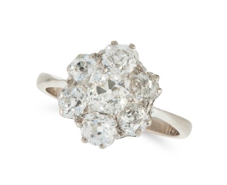 A DIAMOND CLUSTER RING in 18ct white gold, set with a cluster of old cut diamonds totalling 1.2-1.5 carats, stamped 18CT, siz