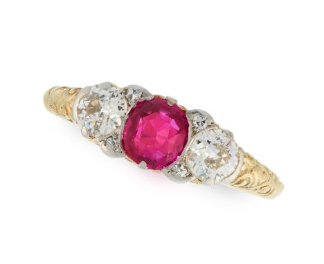 A BURMA NO HEAT RUBY AND DIAMOND RING in yellow gold, set with a cushion cut ruby of 0.82 carats between an old and round cut