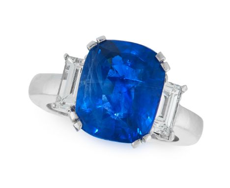 A SAPPHIRE AND DIAMOND DRESS RING comprising of a cushion cut sapphire of 5.67 carats between two baguette cut diamonds, unma