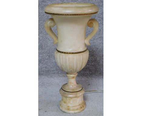 An alabaster table lamp of classical twin handled urn form on pedestal base. H.48cm 