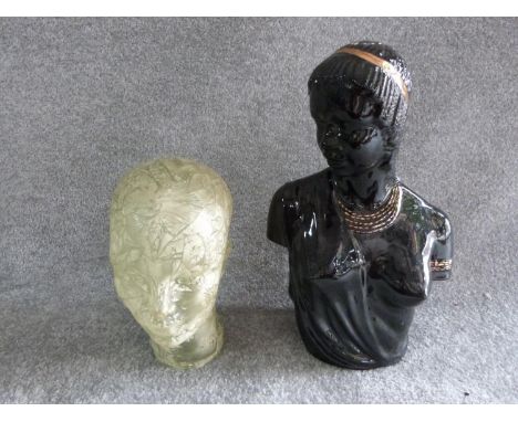 A vintage glass head and ceramic Art Deco African bust with gilded details. H 43cm. 