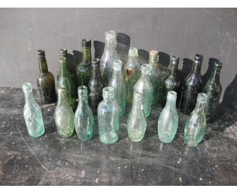 Old Vintage Antique - A collection of old bottles, most with damage of some sort