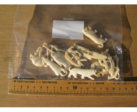 Old Vintage Antique - Bag of carved tribal bone broaches possibly African