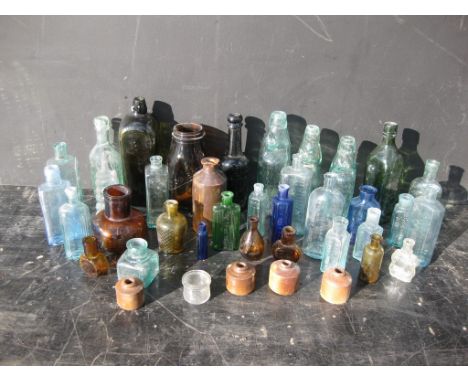 Old Vintage Antique - A collection of old bottles, most with damage of some sort