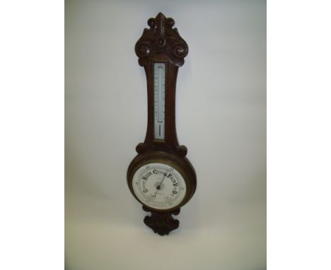 R. Clark of Newcastle-on-Tyne aneroid barometer in carved oak case 