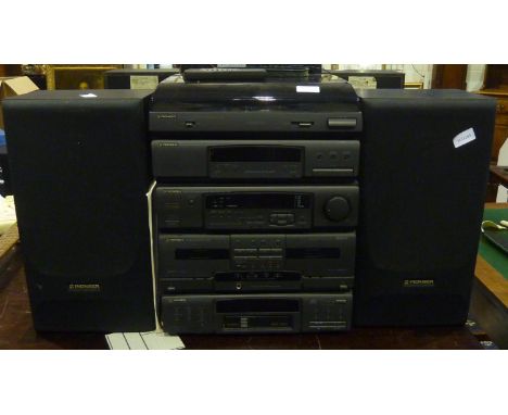 Pioneer stacking stereo system with QD-J115M amplifier and speakers. All electrical items in this lot have been PAT tested fo