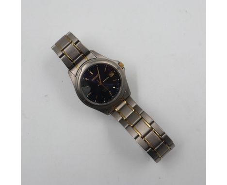 SEIKO: gentlemans titanium quartz wristwatch, model 7N42-8A90, working at lotting. UK P&amp;P Group 1 (£16+VAT for the first 