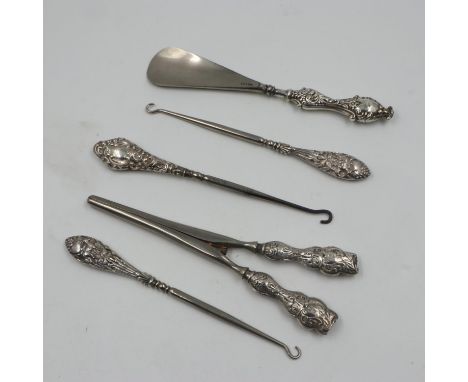 Silver handled button hooks, glove stretcher and shoehorn, UK P&amp;P Group 1 (£16+VAT for the first lot and £2+VAT for subse