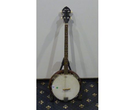 Martin Smith 4 string banjo. Not available for in-house P&amp;P 