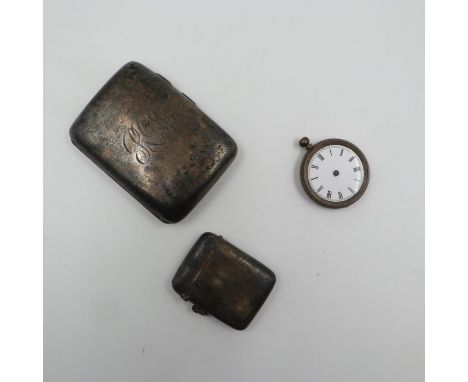 Sterling silver cigarette case and vesta case with an 800 grade Continental silver ladies fob watch (a/f), weight of the ciga