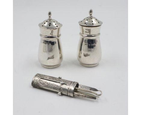 White metal companion lacking one button, and two hallmarked silver peppers, 46g. UK P&amp;P Group 1 (£16+VAT for the first l