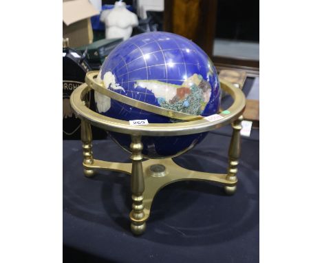 Rotating gemstone globe encased in a brass frame. H: 46cm. Not available for in-house P&amp;P 