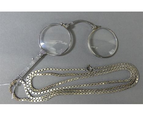   Lorgnette Silber, graviert, an silberner Venezianerkette, zus. ca. 78 g schwer,           