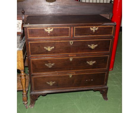 A Georgian mahogany chest of drawers on splayed bracket feet af.