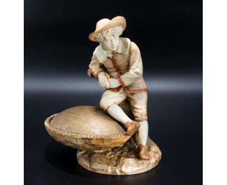 A Royal Worcester figure of a boy leaning against a basket A/F
