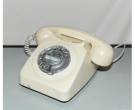 A vintage ivory telephone.