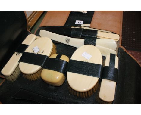 A gentleman's travelling vanity set comprising  brushes, shoe horn and button hook and Collectable items to include postal sc