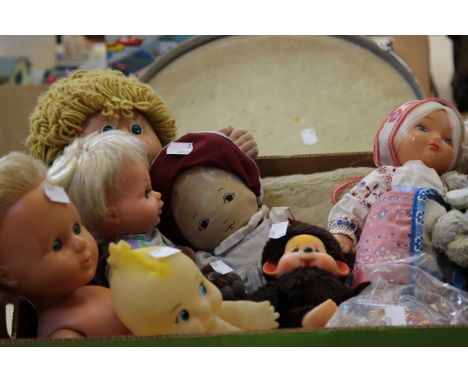 A collection of 1960s and 1970s Ladybird books, 1960s Tiny and Teeny Tiny Tears dolls, a toy drum, plush Polar bear, a 1980s 