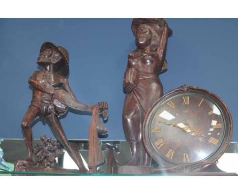 TWO SOUTH ASIAN STYLE WOODEN CARVINGS
one of a women holding a basket on her head, the other of a fisherman; together with a 