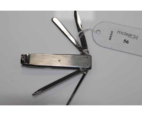 DUNHILL PIPE TOOL
marked to the blade of one tool, with four fold out tools housed in a milled white metal body, 8cm long