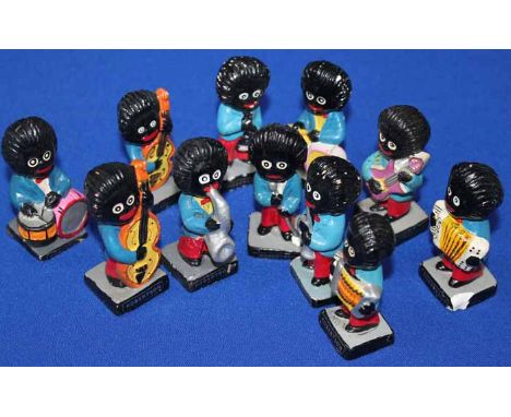 COLLECTION OF NOVELTY FIGURES 
playing in a band