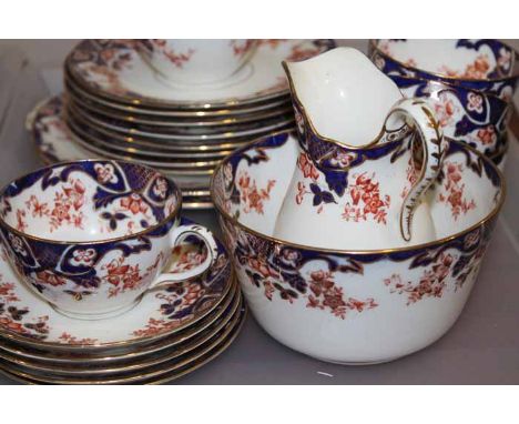 ENGLISH PART CHINA TEA SET
c1900, marked 'A B & Sons Longton', with orange, blue and gilt floral borders on white ground, twe