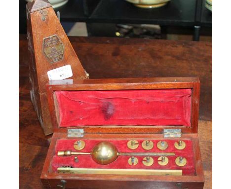 J LIZARS SIKES HYDROMETER
inside a mahogany case; together with a metronome, hydrometer 23cm long