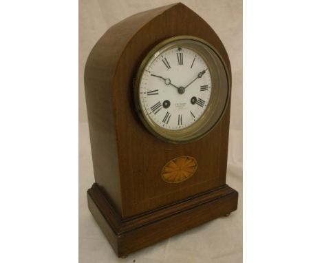 A JW Benson mahogany mantle clock with Roman numerals, the dial marked "J.W.Benson Ludgate Hill London", the body with satinw