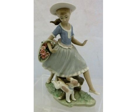 A Lladro figurine of "A girl jumping over a log carrying flower basket and with a puppy at her feet"