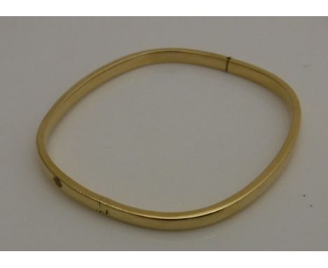 An 18 carat gold square bangle, 7.8 g