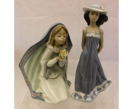 A Lladro figurine of "Susan", No'd. 5644 to base and a Lladro figurine of a girl kneeling with flowers, No'd. 5792 (2)