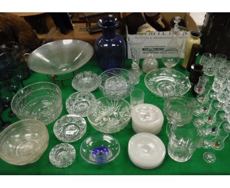 A selection of cut glass to include three Stuart England fruit bowls, various heavy cut glass ashtrays, a Thomas Webb art gla