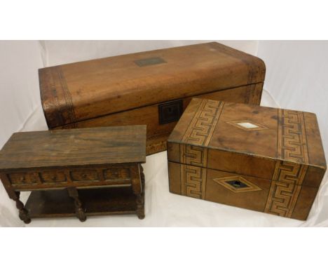 A walnut and parquetry inlaid dome topped writing slope, a mahogany tea caddy with squat bun feet, a walnut and parquetry inl